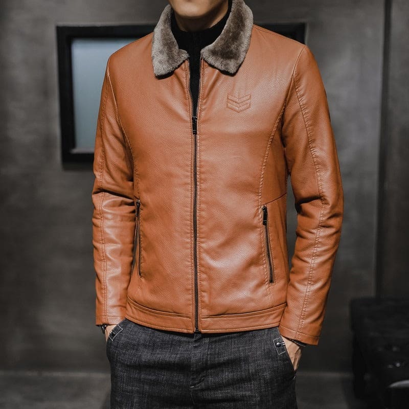 Tan leather jacket with a fur-lined collar and zippered front.