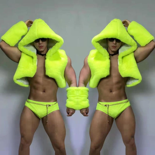 Two muscular figures wearing neon yellow hooded towels and matching briefs in a mirrored pose.