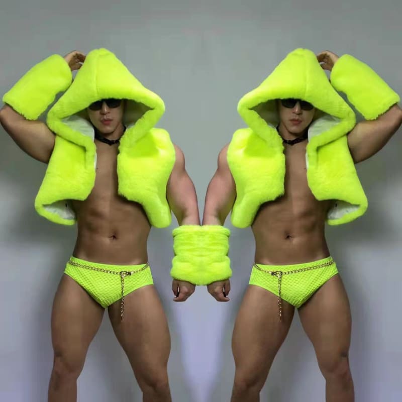 Two muscular figures wearing neon yellow hooded towels and matching briefs in a mirrored pose.