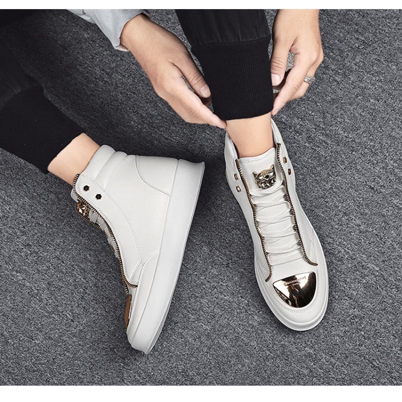 White high-top sneakers with metallic gold accents.