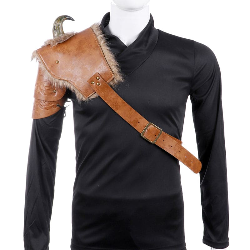 Leather shoulder armor piece with a strap crossing diagonally over a black shirt.