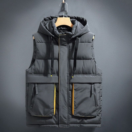 Puffy black sleeveless vest with multiple pockets and a hood.