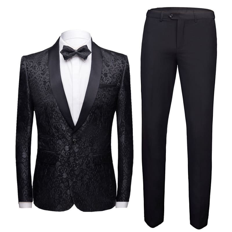 Elegant black tuxedo suit with a patterned jacket, white shirt, and bow tie.