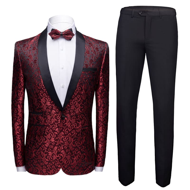 Formal men’s suit with a burgundy floral patterned jacket, black pants, white shirt, and red bow tie.