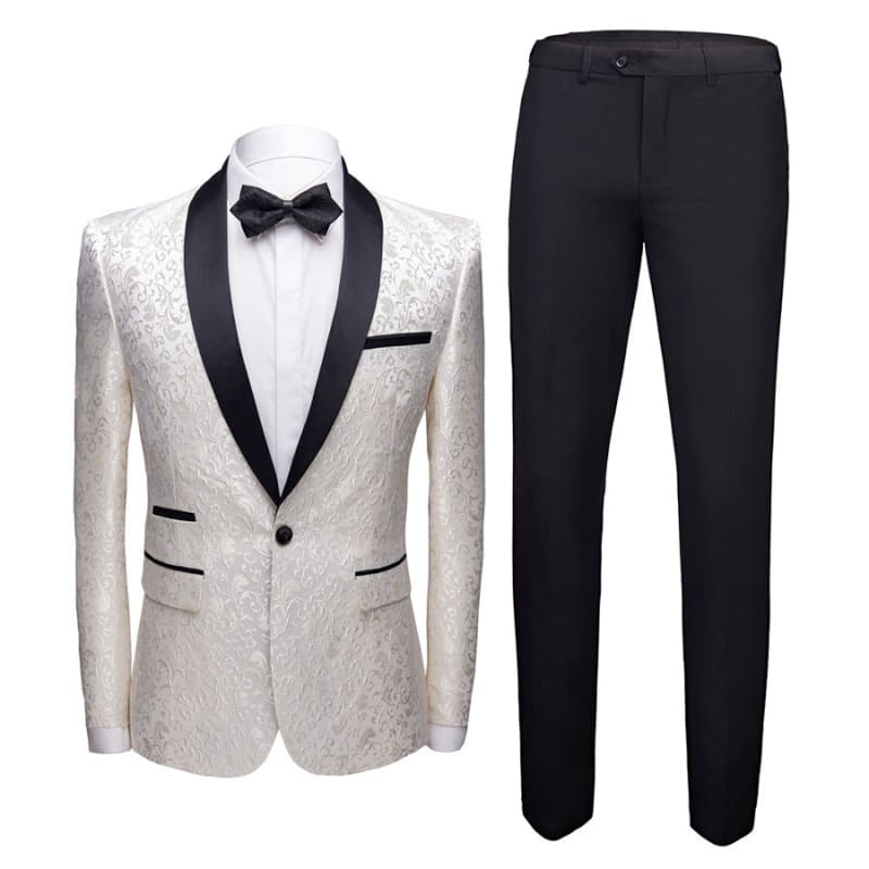 Elegant white tuxedo jacket with black lapels paired with black trousers and a bow tie.