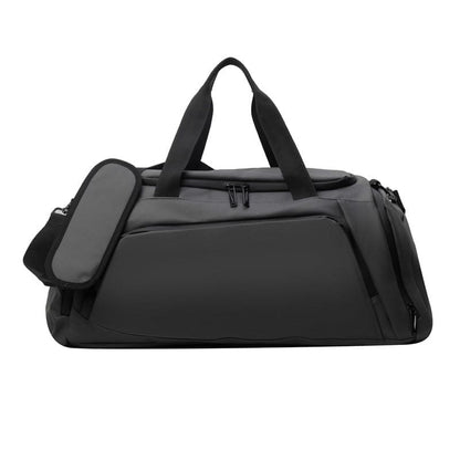 Black duffel bag with multiple compartments and a shoulder strap.