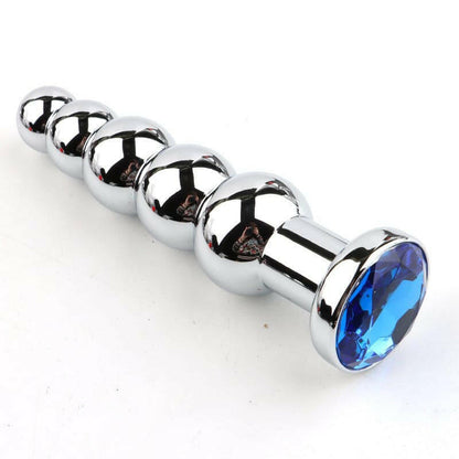 Metal anal plug with graduated beads and a blue jewel end.