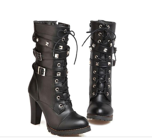 Black leather high-heeled combat boots with laces and buckle straps.