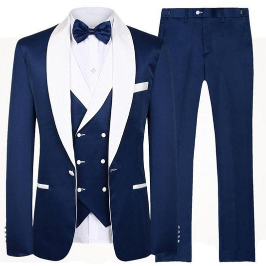 Navy blue three-piece tuxedo with white accents and a matching bow tie.