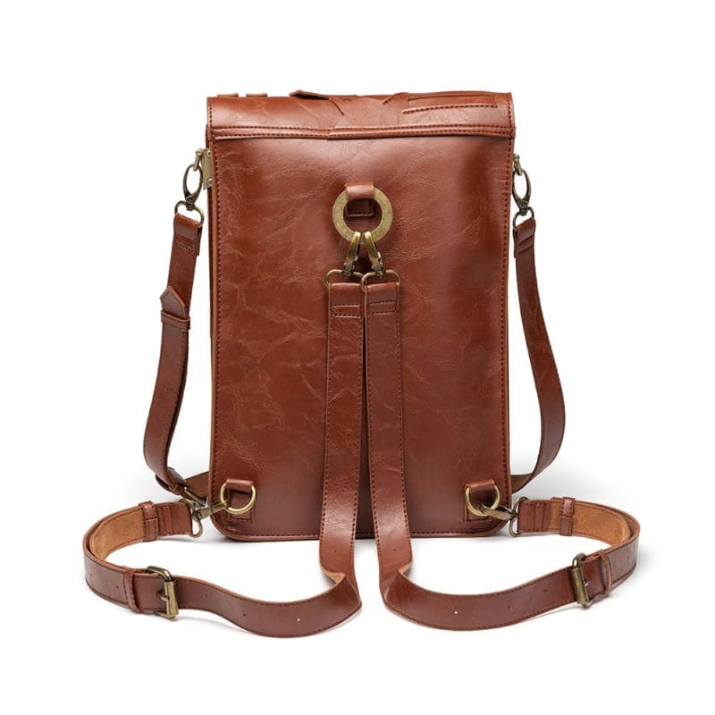 Brown leather backpack with convertible straps and a front tassel detail.