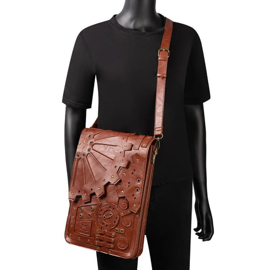 Brown leather messenger bag with embossed steampunk-inspired designs.