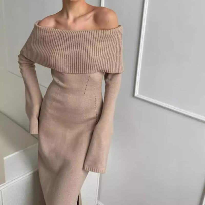 Off-shoulder beige knit dress with a ribbed fold-over neckline and long sleeves.