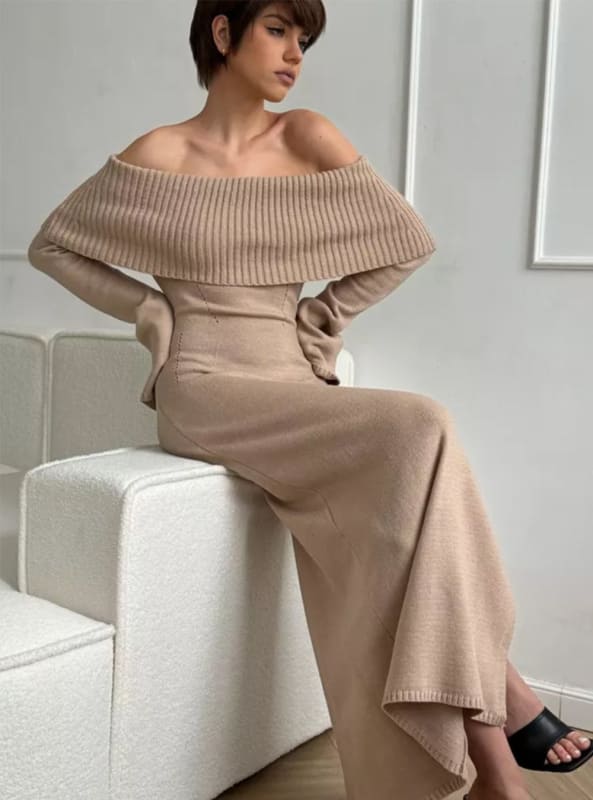 Off-shoulder beige knit dress with a wide collar and fitted silhouette.