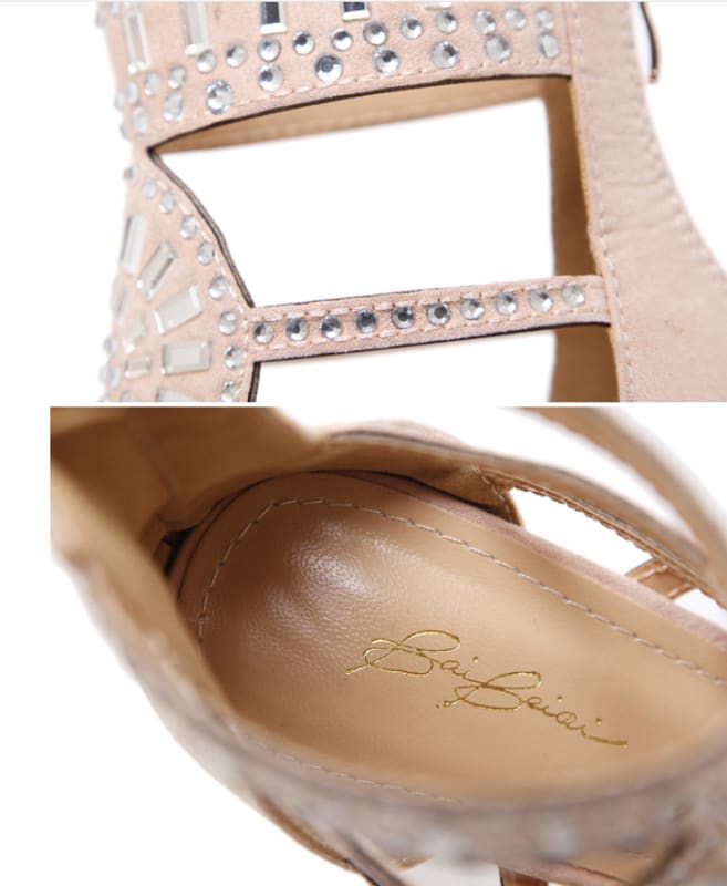 Elegant high-heeled sandal with rhinestone embellishments and a designer label inside.