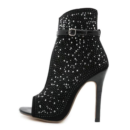 Sparkly black peep-toe ankle boot with a high stiletto heel and buckled strap.