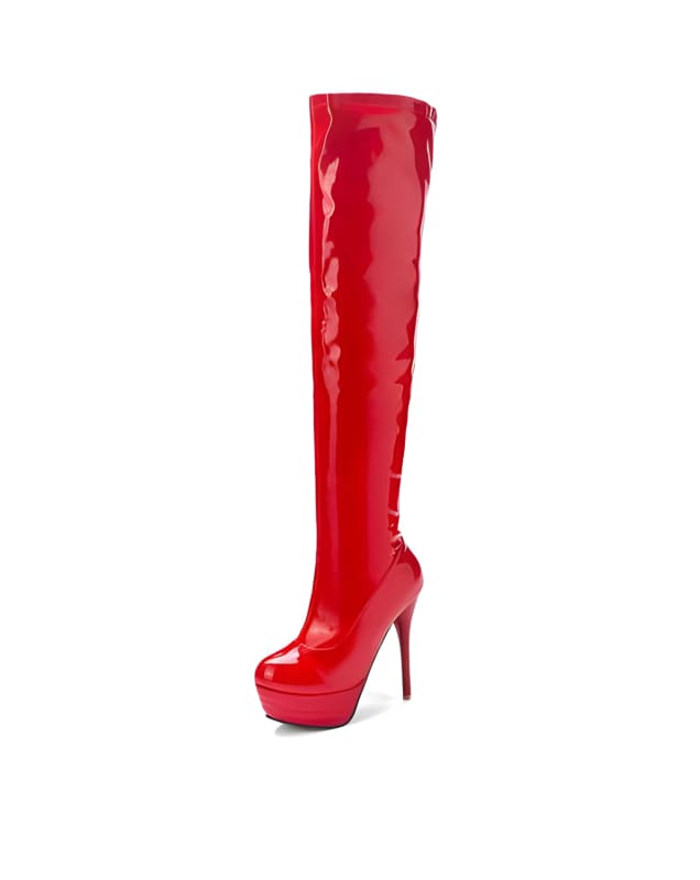 Shiny red patent leather thigh-high boot with a high heel and platform sole.