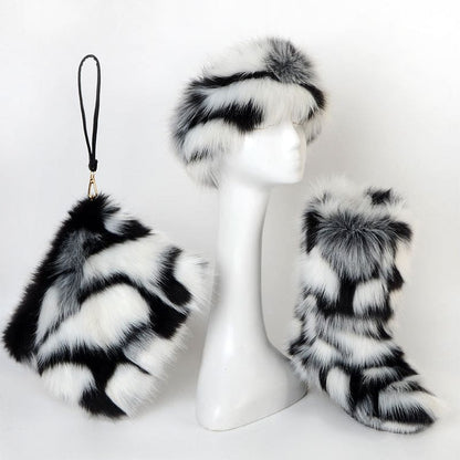 Fluffy black and white fur hat with matching purse and boots.