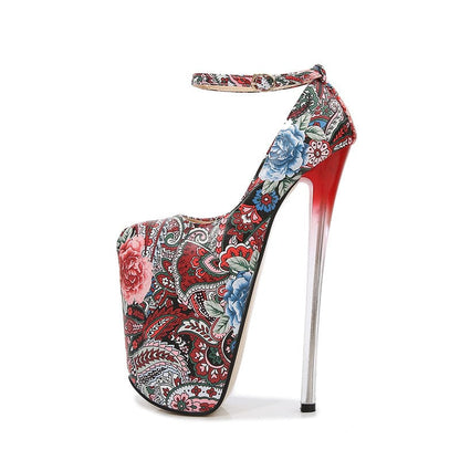 Extremely high platform stiletto heel with a colorful floral and paisley print pattern.