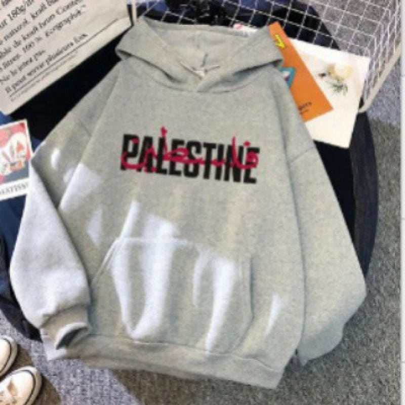 Light gray hoodie with ’PALESTINE’ printed on the front in black and red letters.