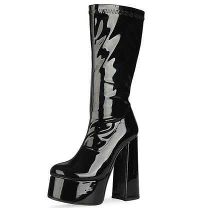 Black patent leather platform boot with a tall chunky heel and knee-high shaft.