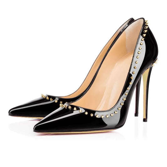 Black patent leather high heel pump with silver studded trim along the edges.