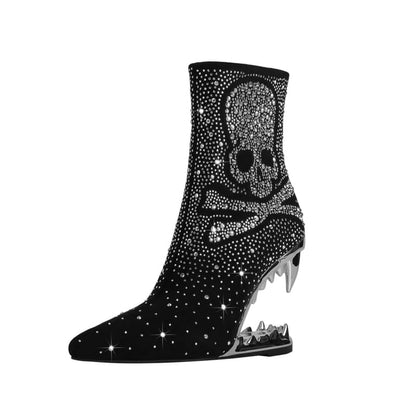 Sparkly black ankle boot with a skull design and clear wedge heel.