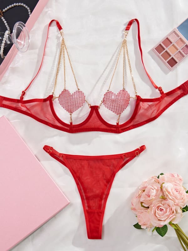 Red lingerie set with heart-shaped details on the bra cups.