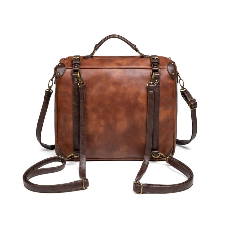 Brown leather messenger bag with multiple straps and buckles.