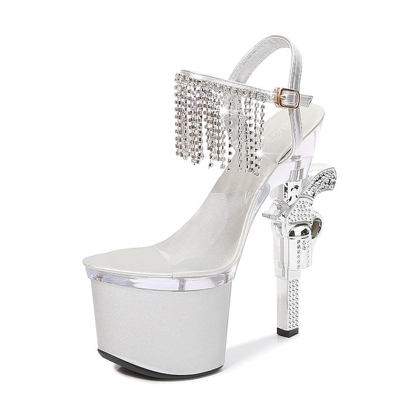 Glittery silver platform high heel sandal with crystal fringe and butterfly decoration.