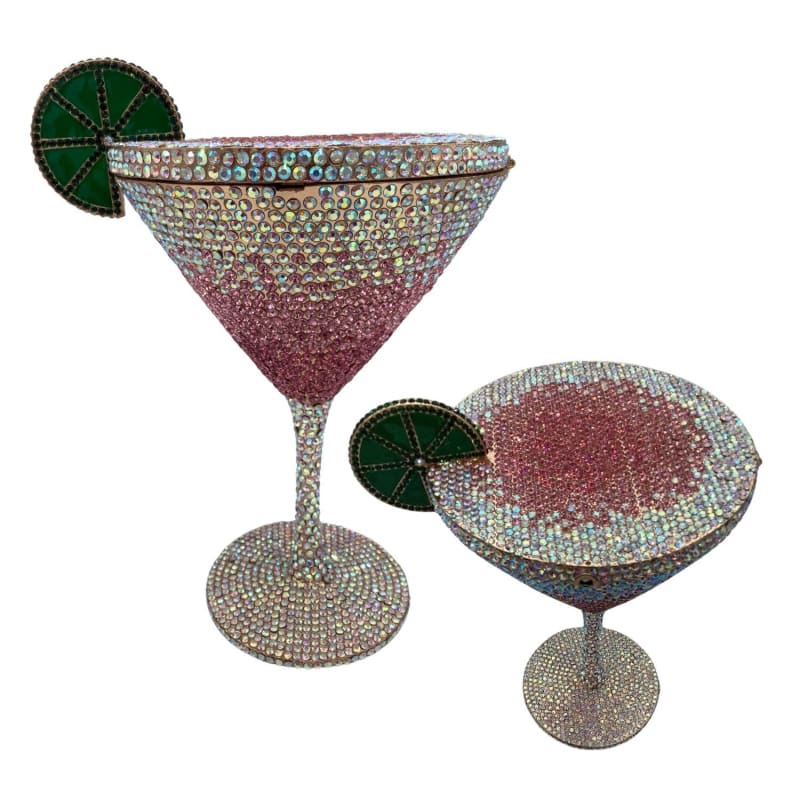 Bejeweled martini glass with a decorative lime slice garnish.