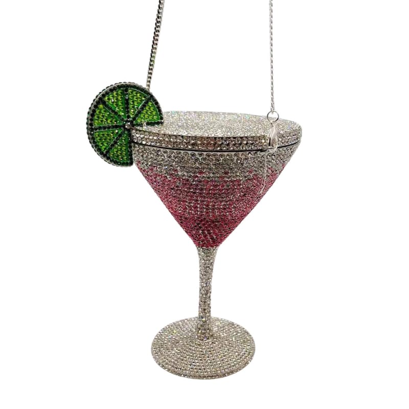 Glittery cocktail glass ornament with a pink-to-silver gradient and lime slice garnish.