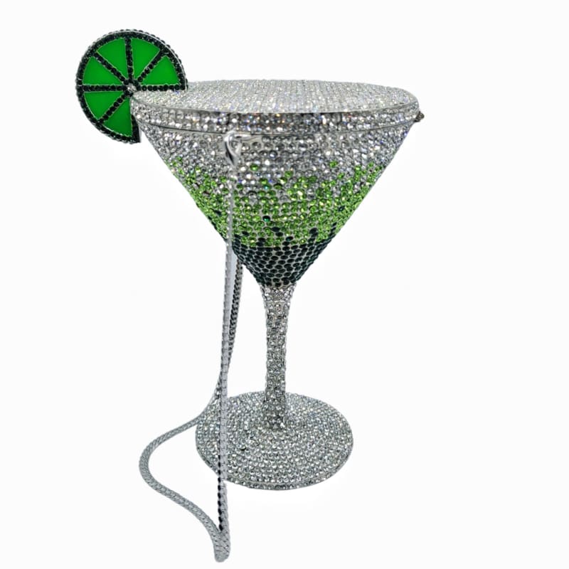 Sparkly martini glass with a lime-green gradient and decorative lime slice garnish.