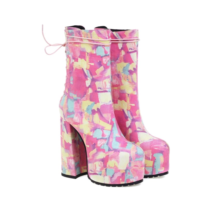 Colorful platform ankle boots with a chunky heel and abstract pastel pattern.