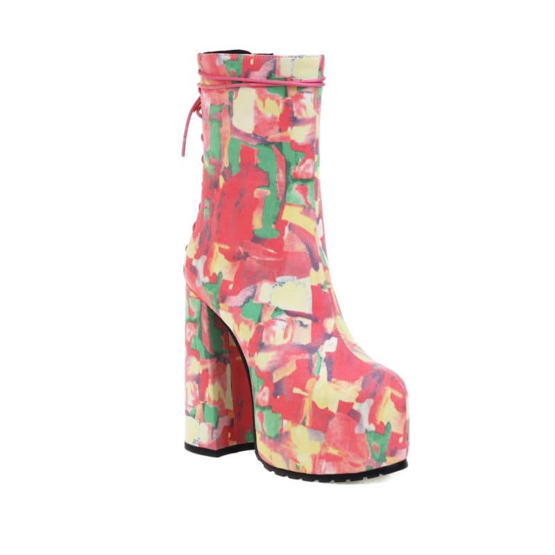 Colorful platform ankle boot with a chunky heel and abstract floral pattern.