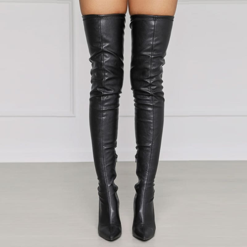 Pair of black leather thigh-high stiletto boots.