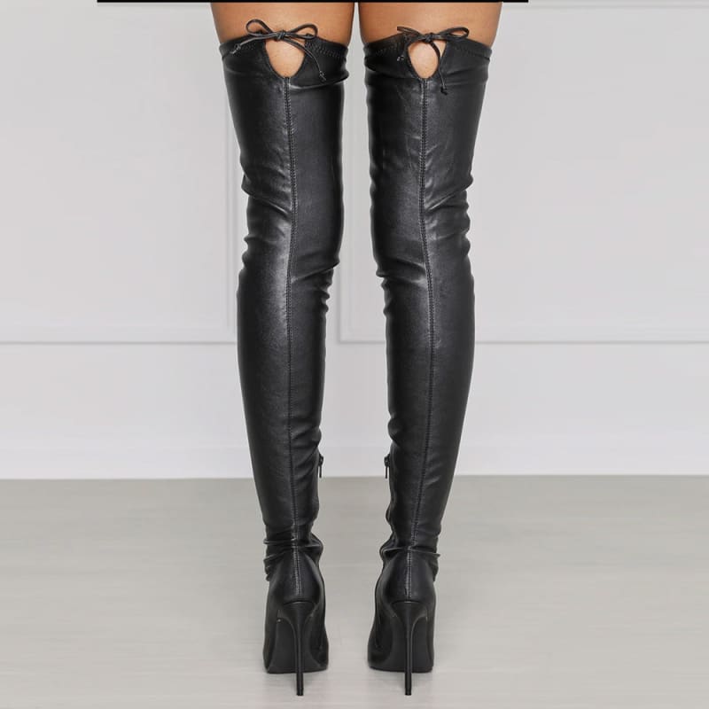 Pair of black leather thigh-high stiletto boots with lace-up details at the top.