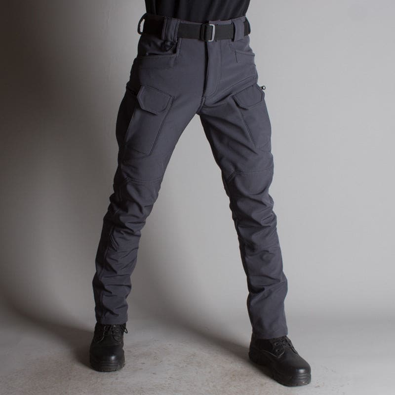 Pair of dark gray tactical or cargo pants with multiple pockets and a belt.