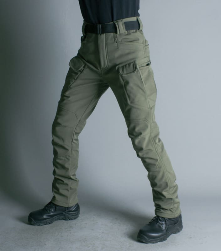 Pair of tactical cargo pants with multiple pockets worn with black boots.