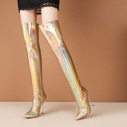 Shiny gold holographic thigh-high stiletto boots.