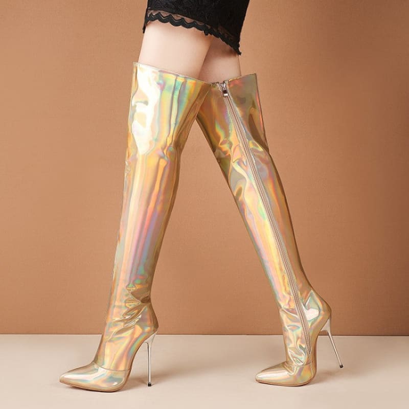 Shiny gold holographic thigh-high boots with stiletto heels.