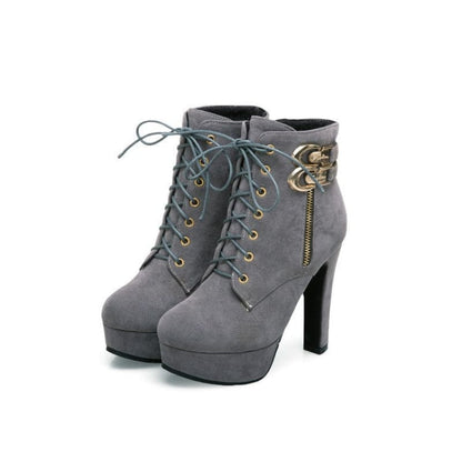 Gray high-heeled ankle boots with laces and a side zipper.