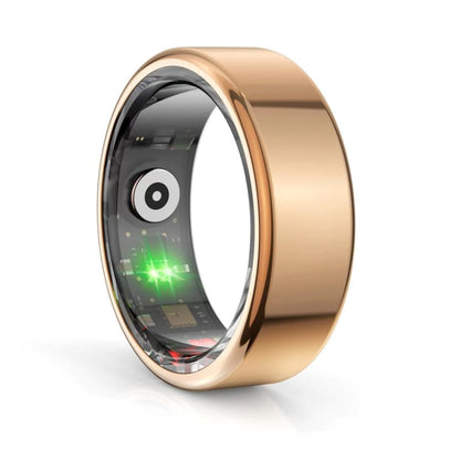 Smart ring with a gold exterior and internal electronic components visible.