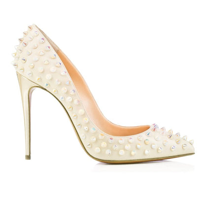 White high-heeled shoe with studded spikes covering its surface.