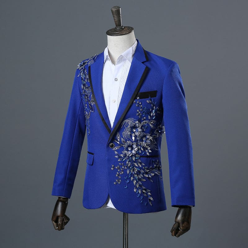 Vibrant blue blazer with intricate silver floral embroidery on the front.