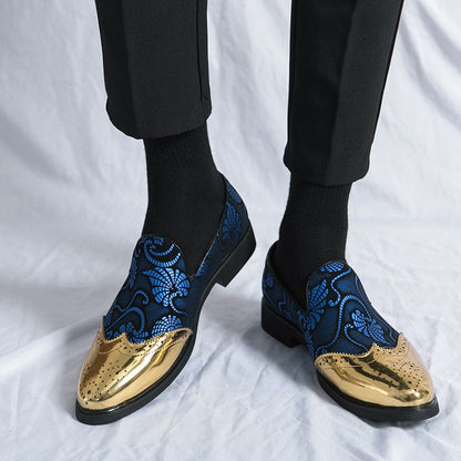 Stylish dress shoes with blue patterned uppers and metallic gold toe caps.