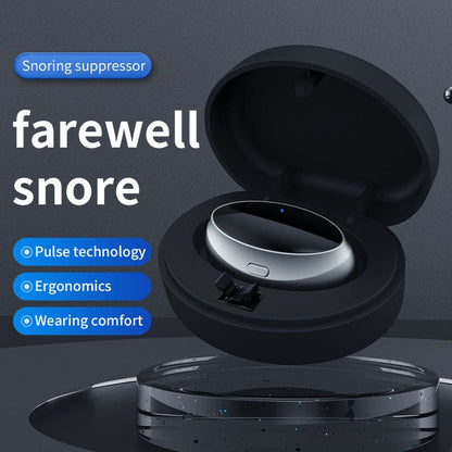 Sleek, oval-shaped electronic device for snoring suppression in a black charging case.