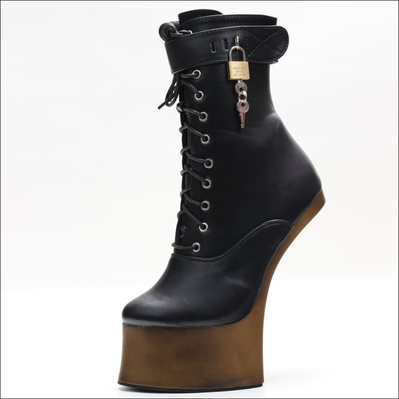 Black leather ankle boot with an extremely high wooden platform sole and no heel.