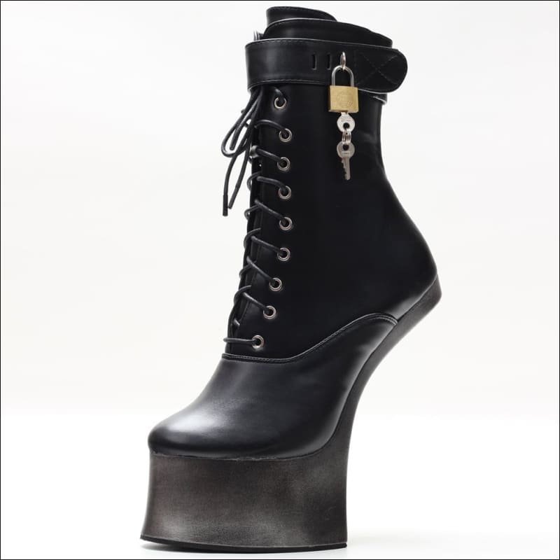 Unusual black platform boot with no heel and a padlock accessory.