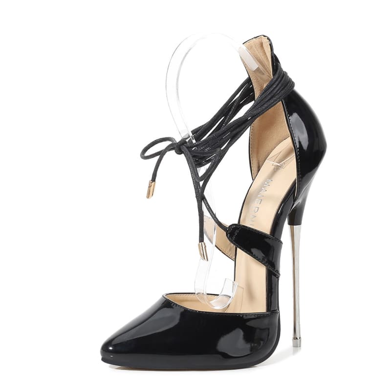 Black patent leather high heel shoe with ankle straps and a metallic stiletto heel.