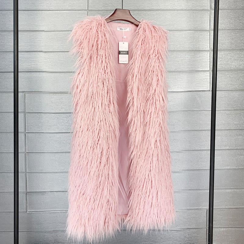 Pink faux fur sleeveless vest hanging on a hanger.